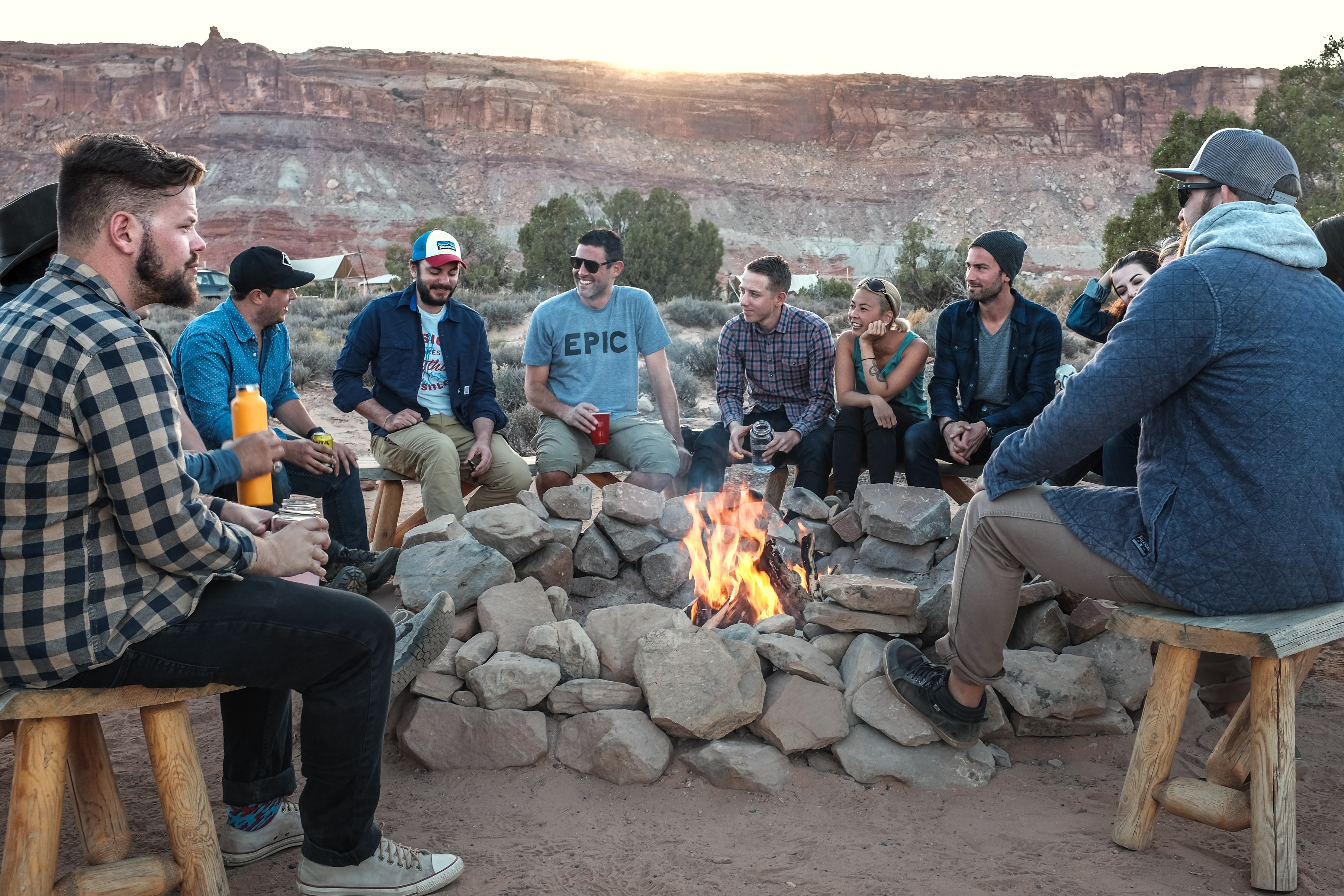 A group sat around a campfire.